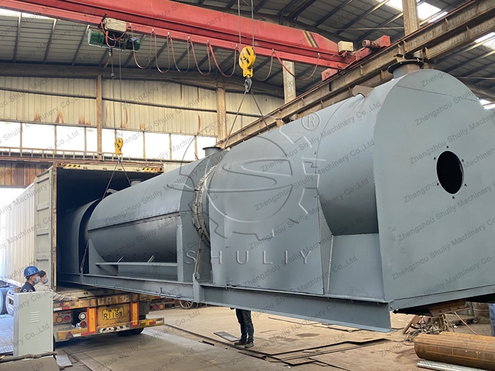 Continuous charring furnace being loaded