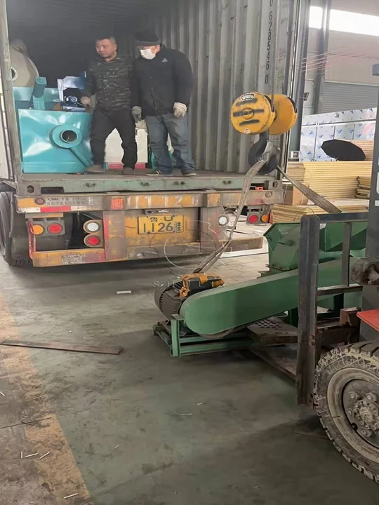 Workers are loading the hookah charcoal machine