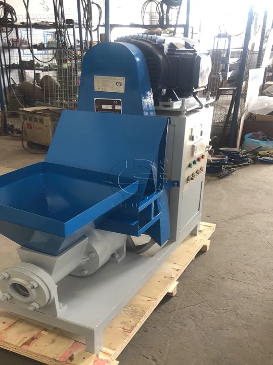 Briquetteing machine